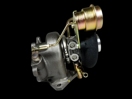 Boost Lab TD06SL2-20G turbocharger, side angle showing wastegate actuator, oil fittings and compressor housing.