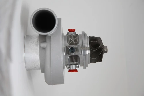 Xona Rotor 54-48 X2C turbo, side view showing compressor wheel, housing, and red actuator caps.