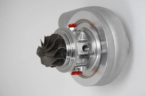 Xona Rotor 57-56 X2C turbo CHRA, front angle showing compressor wheel and billet housing with red plugs