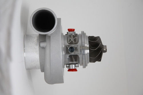 Xona Rotor 61-56 X2C turbocharger, side view showing compressor wheel, housing and red fittings.