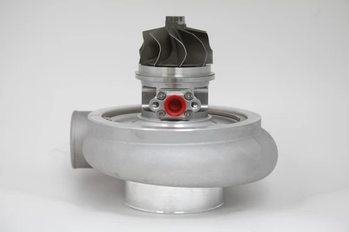 Xona Rotor 95-67 X3C turbo, front view showing compressor wheel, housing and red fitting cap.