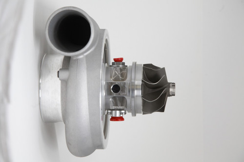 Xona Rotor 78-65 X3C turbo, side angle showing compressor wheel, wastegate, and housing ports