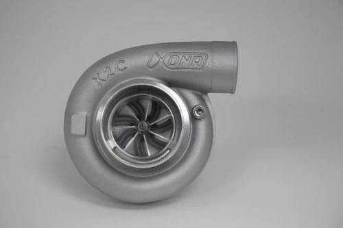 Xona Rotor 71-64 X2C turbo, front view showing compressor wheel, housing and outlet elbow