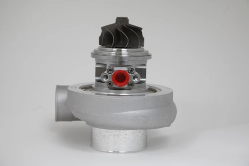 Xona Rotor 54-56 X2C turbo, front view showing compressor wheel, billet housing, and red plug fitting