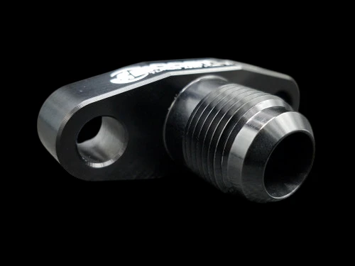 Boost Lab billet T3/T4 turbo oil drain flange, black, angled view showing -10 AN threaded fitting and bolt hole