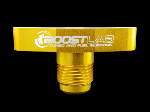 Front view of the Boost Lab BL Billet T3/T4 Turbo Oil Drain Flange, gold anodized, -10 AN threaded fitting.