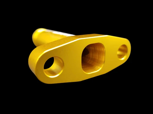 Gold anodized billet T3/T4 turbo oil drain flange with extended -10 AN fitting, angled top view