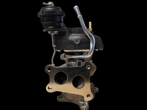 Boost Lab TD06SL2-54X turbocharger, side view showing wastegate actuator, chrome coolant line, and dual inlet flange.