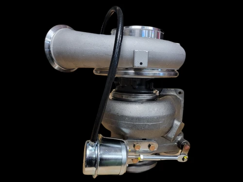 K31 turbocharger for Detroit Diesel Series 60, side view showing compressor housing and wastegate actuator