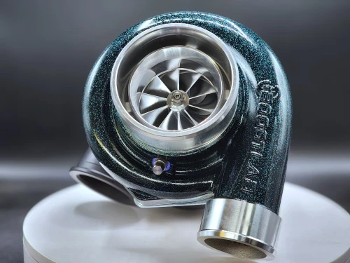 Boost Lab RTG BL66X turbo in Disco Teal, front angle showing compressor wheel and inlet housing