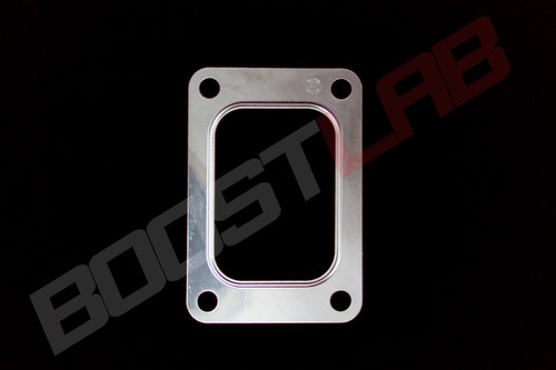 T6 turbo inlet gasket, flat metal plate with rounded rectangular center opening and four bolt holes.