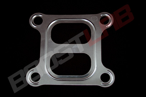 CT26 divided turbo gasket for MR2, top view showing four bolt holes and dual center ports