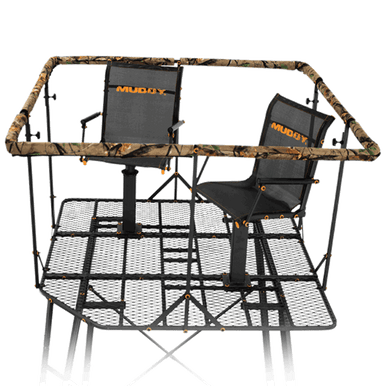 Muddy Outdoors - 12' QUAD POD Steel construction • Height: 12-foot tall •  Exterior 2-rail ladder for easy entry • Padded, full surround 36” high  shooting rail • Metal platform measures 57