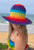 Adult summer hat, crochet rainbow perfect for shows, carnivals, concerts, gigs, festivals, or raves. One size fits most.  Shop online or instore at Singapore Charlie's Cairns Australia.