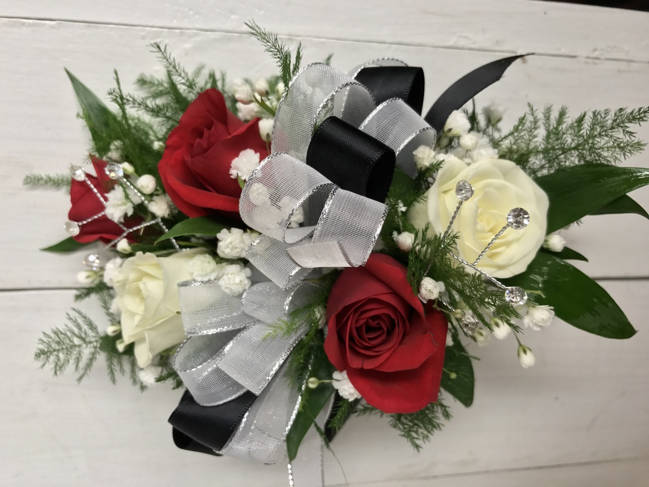 red and white corsage