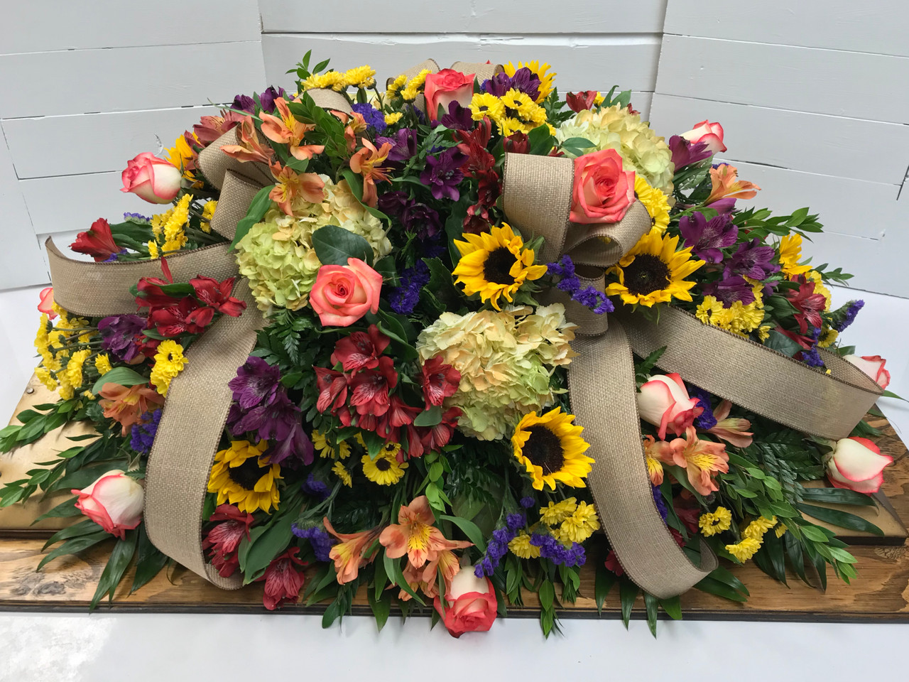 Shades Of Autumn Half Couch Casket Spray Centerville Florists