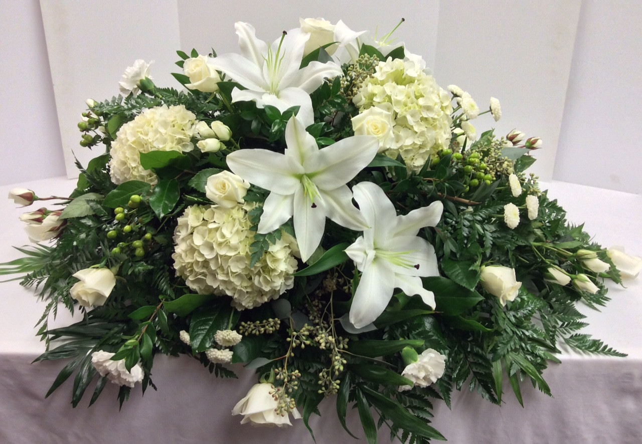 Stunning Red and White Garden Full Couch Casket Spray Centerville