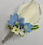 White Rose Boutonniere with delphinium and kalanchoe