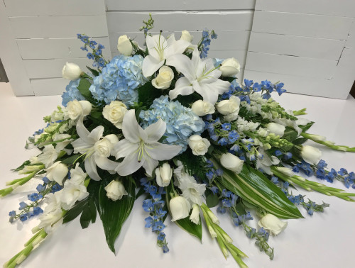 Soft Blue and White 1/2 Couch Casket Spray - Centerville Florists