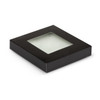 A square black box containing a transparent glass coaster set. The box has a viewing window to display the coasters.