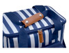 A navy striped cooler bag with a brown leather handle and a zippered closure. It also features sturdy blue straps.