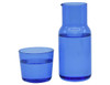A blue glass carafe next to a matching tumbler, both filled with water. The carafe features a sleek, modern design.