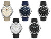 A collection of five unisex solar watches featuring various dial colours, with rPET straps and metallic cases. Each watch has a logo.