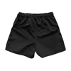 Black youth rugby shorts featuring an elastic waistband and side pockets, with a logo.