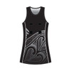 A black netball dress with a racerback design featuring intricate grey patterns and a logo.