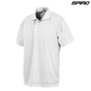 A white polo shirt with a collar and short sleeves, featuring a logo on the upper right.