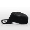 A black trucker cap with a mesh back, featuring a logo on the side.