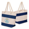A navy and cream striped tote bag with twisted handles and a logo on the front.