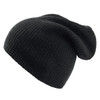 A black beanie made of ribbed fabric, featuring a slouchy design and a discreet logo.