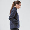 A navy women's Cirrus Bonded Jacket with a high collar and zippered pockets, featuring a logo.