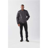 A men's quilted thermal jacket in black is worn by a model, featuring a front zip and a casual fit.