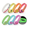 A collection of colourful silicone wristbands in various designs, including glow-in-the-dark elements.