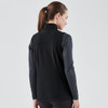 A black women's softshell vest with a high collar, featuring a fitted design and long sleeves.