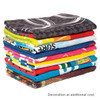 A stack of vibrant beach towels in various colours and patterns, with a textured grey towel on top.