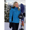 A blue women's jacket with black accents, worn by a woman holding a snowboard in a snowy landscape.