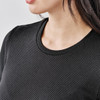 A close-up of a black crew neck shirt featuring a textured fabric and a round neckline.