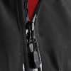 A close-up of a black softshell jacket featuring a zip, with a red inner lining visible. It has a logo on the zipper.
