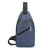 A blue travel sling chest bag featuring a front zip pocket and an adjustable strap. It has a logo on the front.