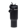A drink bottle in matte black with a handle, featuring a spout and a secure lid. It has a branding logo.