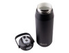 A drink bottle in matte black with a stainless steel interior and a quick release lid. The lid features a handle and a spout, and includes branding.