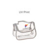 A clear waterproof cosmetic bag with a silver trim and a branded logo on the front.