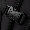 A close-up of a black buckle and strap on a backpack, showcasing its sturdy design and material.