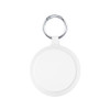 A keyring with a round, white attachment featuring a textured rim, ideal for holding keys or small items.