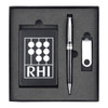 A black gift set containing a pen, a USB drive, and a card holder, all neatly arranged in a black box with a logo.