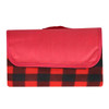 A red and black checkered picnic blanket, folded with a red cover and featuring a logo.