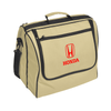 A beige picnic basket with a black trim and a front pocket, featuring a logo.